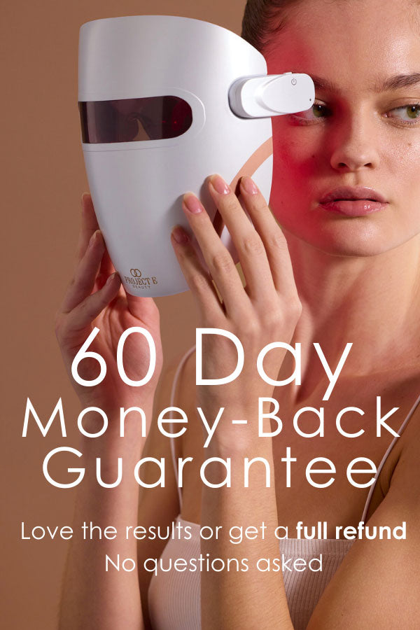 Close-up of model wearing Project E Beauty LED face mask for targeted red light therapy and acne treatment.